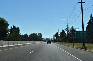 Coburg Road leads south from OR 569 and Exit 12 along a commercial and residential arterial to I-105/OR 126 and into Downtown Eugene across the Willamette River.
