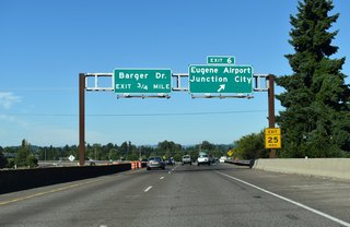 OR 99 (Pacific Highway) runs 1.3 miles north from the folded diamond interchange (Exit 6) with OR 569 to Airport Road and 8.6 miles to 1st Avenue within Junction City. Airport Road west leads to Eugene Airport.