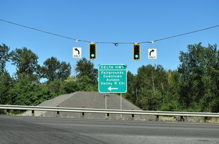 OR 132 (Delta Highway) travels two miles south from OR 569 to the exchange with I-105/OR 126 to Downtown, adjacent to the Valley River Center shopping complex