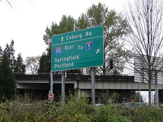 Looking at the guide sign posted on Coburg Road northbound at the eastbound ramp to Interstate 105 & OR 126 from the adjacent pedestrian / bike path. Traffic interests to Interstate 105 & OR 126 westbound to Delta Highway and west Eugene must use Southwood Lane between Coburg Road and the freeway on-ramp at Country Club Road. Southwood Lane travels west along the freeway between the two half diamond interchanges of Exit 2.