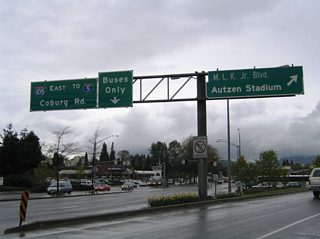 A short ramp carries motorists from Coburg Road north onto Martin Luther King Jr. Boulevard east. MLK Boulevard travels east to Autzen Stadium, home of the Oregon Ducks college football team. The east-west through route becomes Centennial Boulevard en route to downtown Springfield.