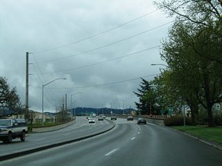 Just south of the 3rd Avenue on-ramp is the elevated portion of Coburg Road. Coburg Road follows a four lane viaduct to the ramps with OR 99 & 126 Business (Broadway, Mill Street, 6th & 7th Avenues).