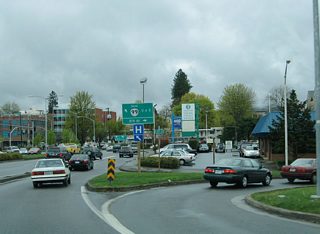 The right lane defaults onto 8th Avenue into downtown Eugene. OR 99/126 Business turn east at the merge with Broadway toward the University of Oregon campus.