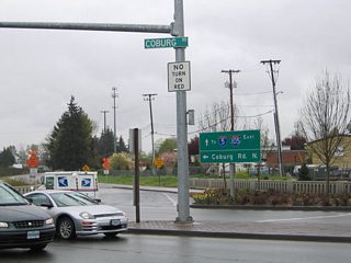 Country Club Road ends at the traffic light with Coburg Road. The right lane provides access onto Interstate 105 & OR 126 eastbound across Coburg Road. Drivers otherwise default onto Coburg Road northbound ahead of its intersection with Southwood Lane west and Oakway Drive north.