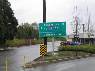 The split diamond interchange of Interstate 105 & OR 126 consists of a frontage roads between Country Club Road and Coburg Road. The westbound road consists of Southwood Lane. The eastbound roadway carries the Country Club Road name between Club Road and Coburg Road. Pictured here is the split with a discontinuous section of Martin Luther King Jr. Boulevard leading directly to Coburg Road southbound for the Ferry Street Bridge.