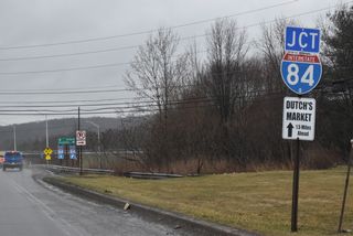 PA 507 meanders along the east side of Lake Wallenpaupack southwest into Greene Township ahead of the diamond interchange (Exit 20) with Interstate 84.