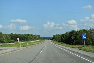 Interstate 86 advances east across rural Greenfield Township past Ashton Corners.