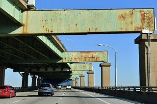 The Girard Point Bridge spans the Schuylkill River and portions of Roosevelt Park and the Philadelphia Naval Business Center. The business park was established following the closure of the Philadelphia Navy Yard as a military base on September 30, 1995.