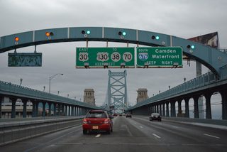 U.S. 30 (Admiral Wilson Boulevard) partitions with Interstate 676 just beyond the Benjamin Franklin Bridge north of Downtown Camden.