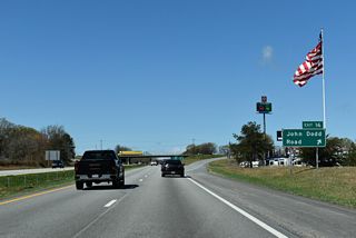 John Dodd Road (Road 60) leads 0.65 miles northeast from Exit 16 to U.S. 176 (Asheville Highway) at Dodd Hill.