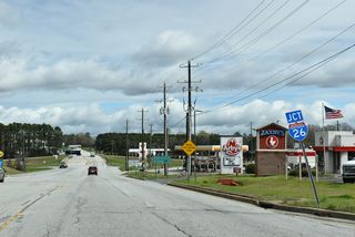 S.C. 72 heads northeast from S.C. 56 along the Clinton city line to reenter the city limits at Corporate Center Drive and Clinton Park Corporate Center. The five lane boulevard next meets Interstate 26.