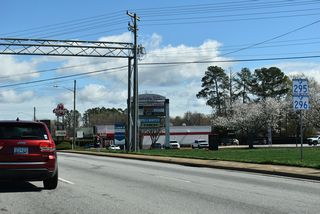 S.C. 295 south joins S.C. 295 east along John B. White, Sr. Boulevard for 0.90 miles from S.C. 215 (Blackstock Road) to Southport Road.