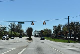 Dorman Centre Drive is an access road leading northeast to additional big box retail centers and U.S. 29 (W.O. Ezell Boulevard) across from Westgate Mall Drive.