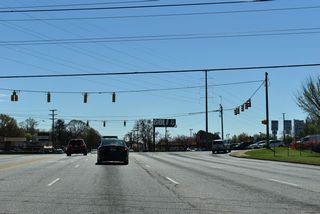 S.C. 215 follows Blackstock Road south from S.C. 295/296 to Roebuck. S.C. 295 turns east alongside S.C. 296 for 0.90 miles to Southport Road in Spartanburg. Beyond the adjacent SPUI with I-26, S.C. 296 continues west to Reidville.