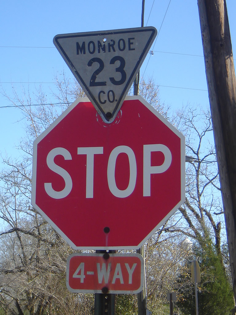 Monroe County 23 (Perdue Road) turns south here at this intersection with Central Avenue in Frisco City.