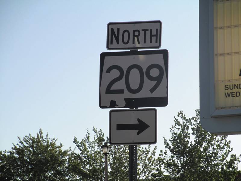 Alabama 209 north at its southern terminus in Centreville. The state route measures only 0.3 miles in length connecting AL 58 and U.S. 82.