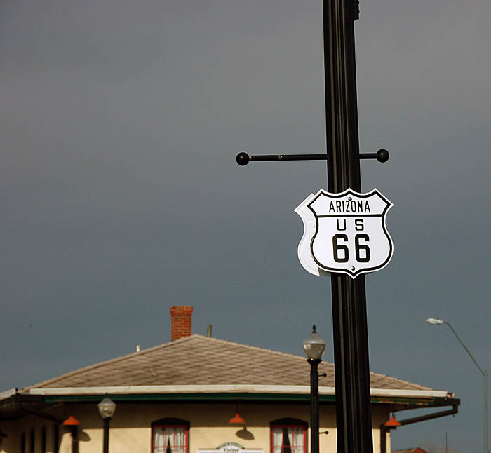 Embossed US-66 markers in the town of Williams.