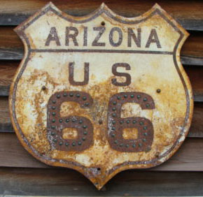 Replica of a US-66 marker of a shape and style that was never used.