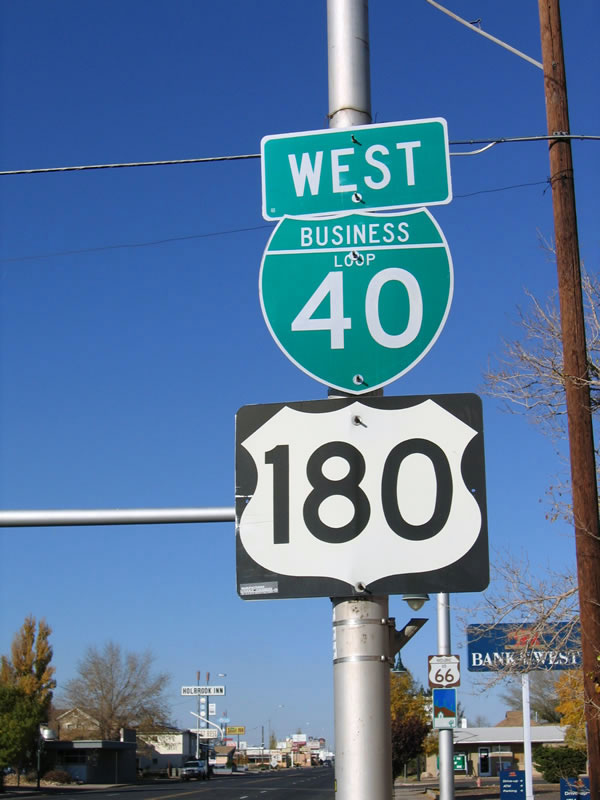 Westbound Business Loop I-40, U.S. 180, and (here unsigned) Historic U.S. 66 on Hopi Drive in downtown Holbrook after Arizona 77 intersection.