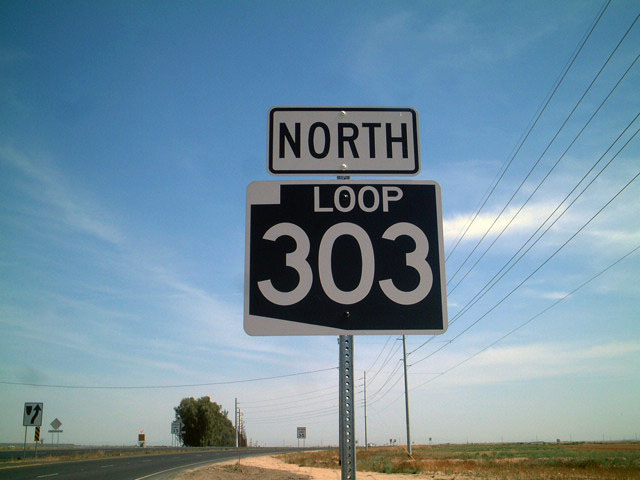 First reassurance shield along northbound Cotton Lane north of Interstate 10/Exit 124.
