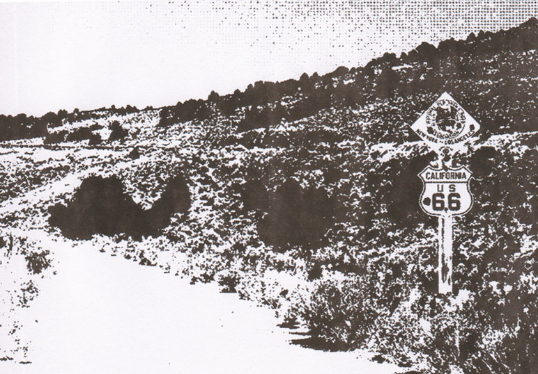 15" National Old Trails Road diamond posted along with 16" US-66 blue-logo shield. The only known photo of the 15" diamond sign in field use.