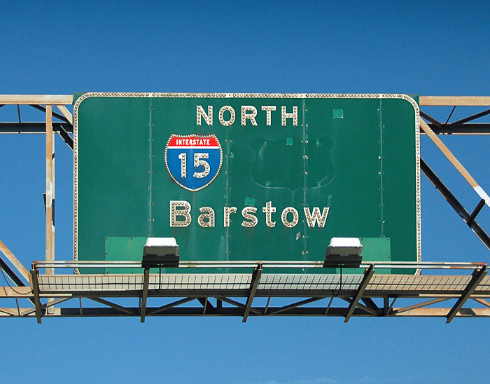 I-15 and US-395 guide sign approaching Cajon Pass. The US-395 shield was taken off in 1972.