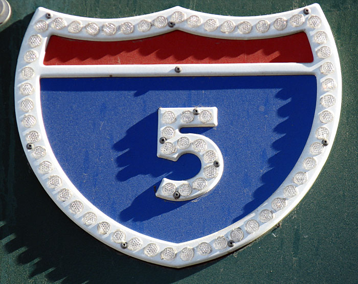 Close-up of shield on 1970s guide sign.