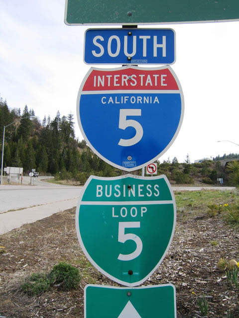 Interstate 5 and Business Loop 5 shield assembly at the south end of U.S. 97 in Weed.
