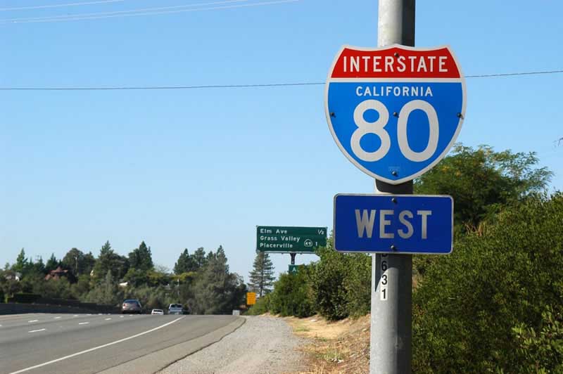 Westbound Interstate 80 approaching Elm Avenue exit in Auburn.