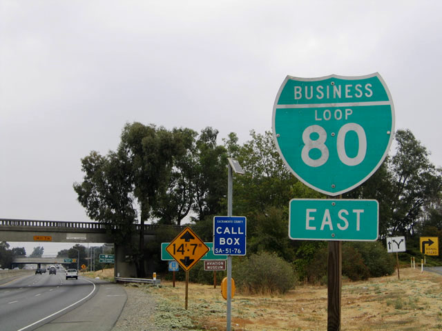 Last eastbound Business Loop I-80 reassurance shield along the mainline. Exits 14A-C are approaching ahead.
