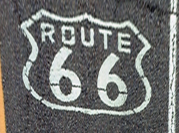 Route 66 marker painted onto the road near Amboy.