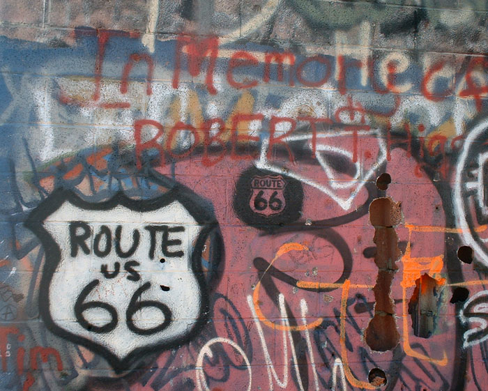 Graffiti on the side of an abandoned building in Chambless on old US-66.