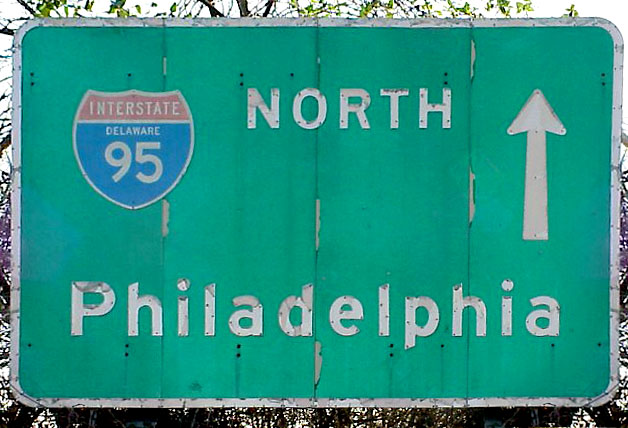 State-named shield for Interstate 95 posted on a guide sign along Jackson Street south of Delaware 52 (Delaware Avenue) in Wilmington. This and a similar nearby sign were replaced by 2008; the state-named shields were replaced in 2000.