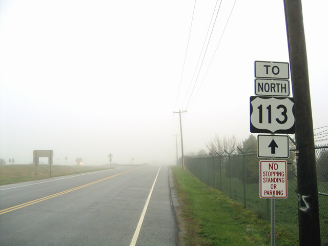 U.S. 113 northbound trailblazer that was posted along Kitts Hummock Road near the Delaware 9 south end with Bay Road. This sign was replaced by 2007 and an interchange between DE 1 and 9 completed by 2010.