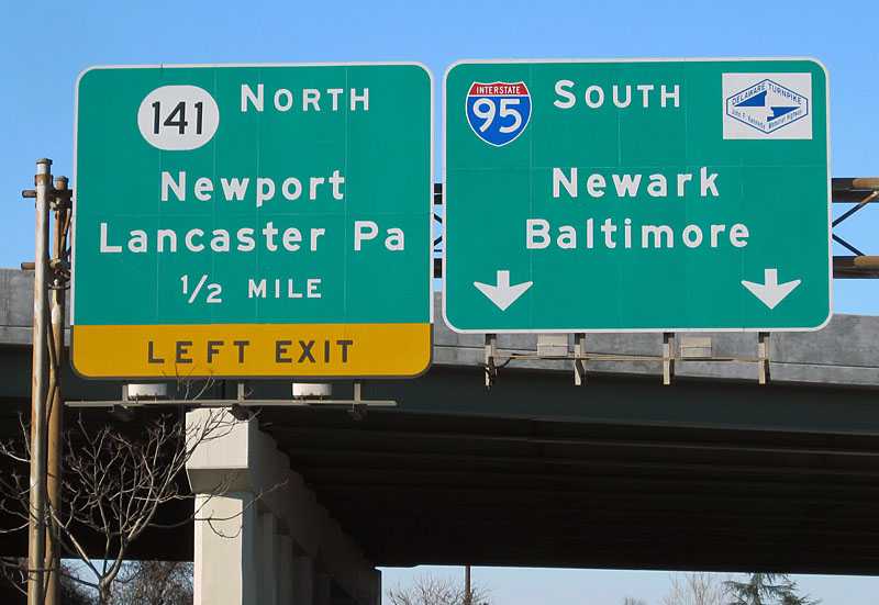 The last surviving Delaware Turnpike markers are on these two green guide signs. The trailblazers appeared in 1995.