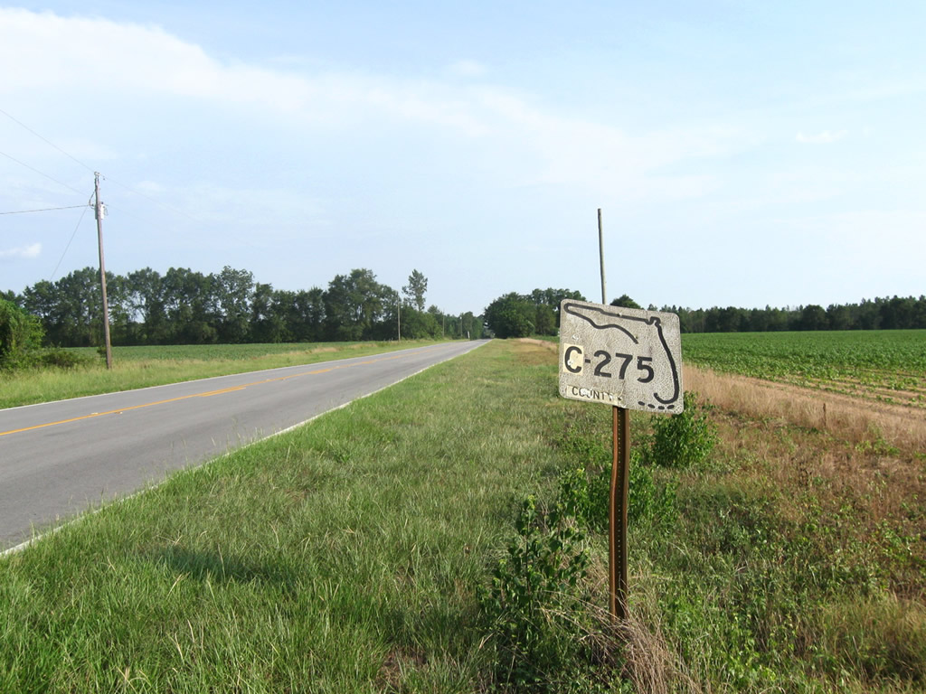 Reassurance marker for southbound Calhoun County 275 after its intersection with Calhoun County 275A.
