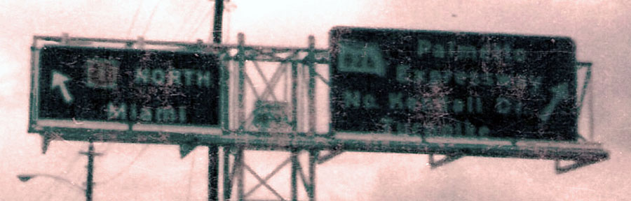 Rarely seen colored shield on a green guide sign. A surface-level shield was attached to the green sign.