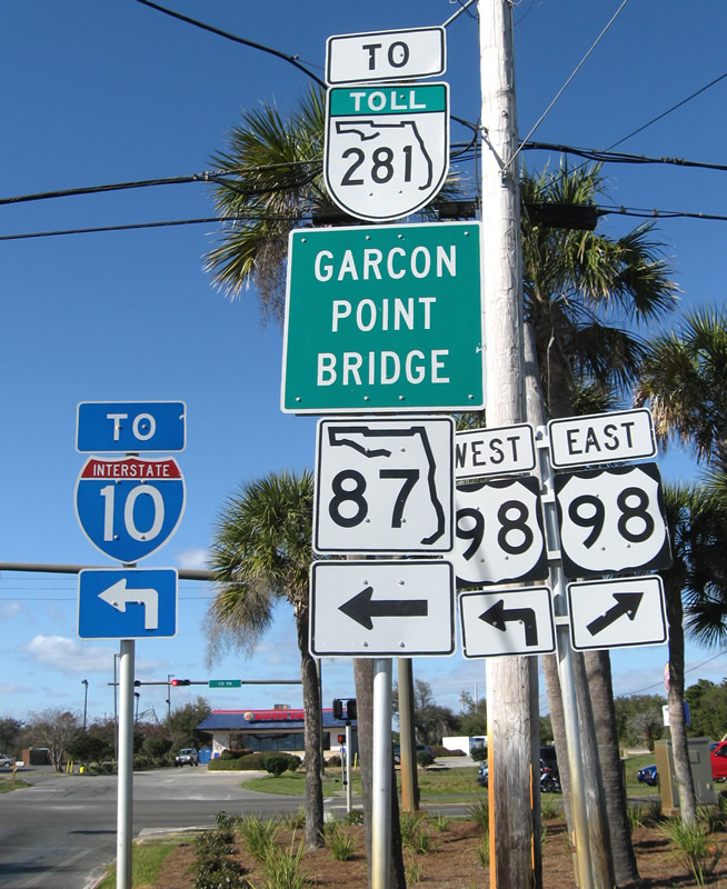 Florida 281 Toll, Interstate 10, Florida 87, U.S. 98 shield assembly posted at the end of the Navarre Beach Bridge.