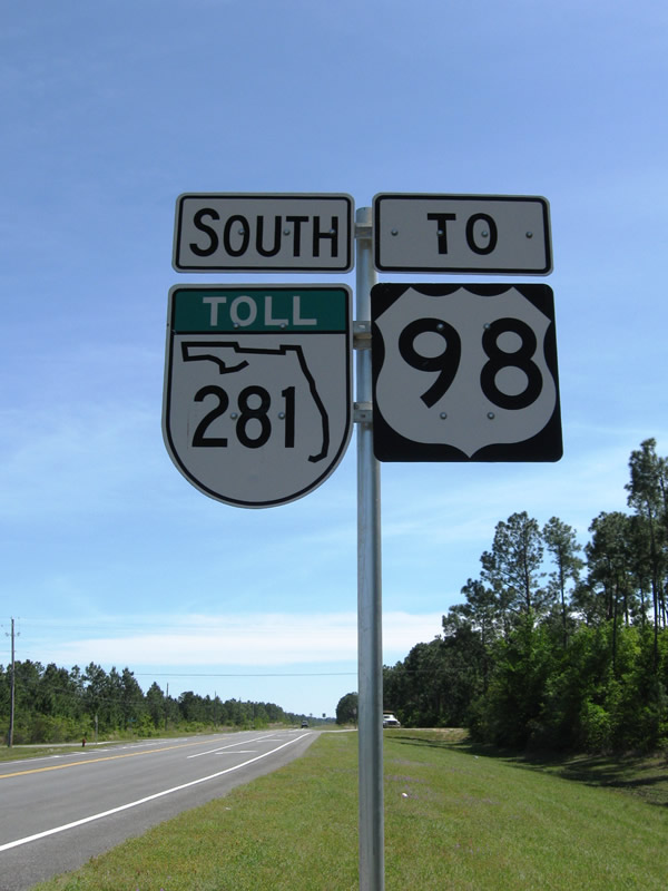 Florida 281 Toll southbound shield assembly with companion U.S. 98 trailblazer, posted along Avalon Boulevard ahead of Pearson Road.
