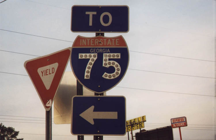 Northbound off-ramp from Interstate 575 at Exit 1.