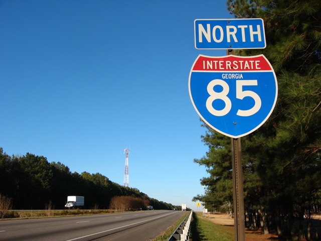 First northbound shield at welcome center after state line.