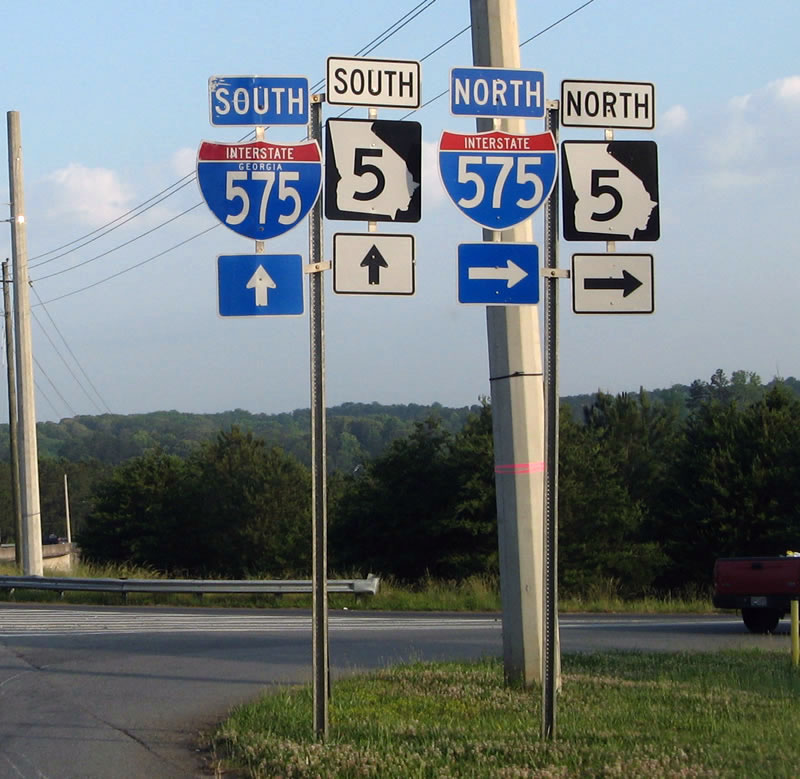 Westbound Sixes Road at Interstate 575 north on-ramp (Exit 11).