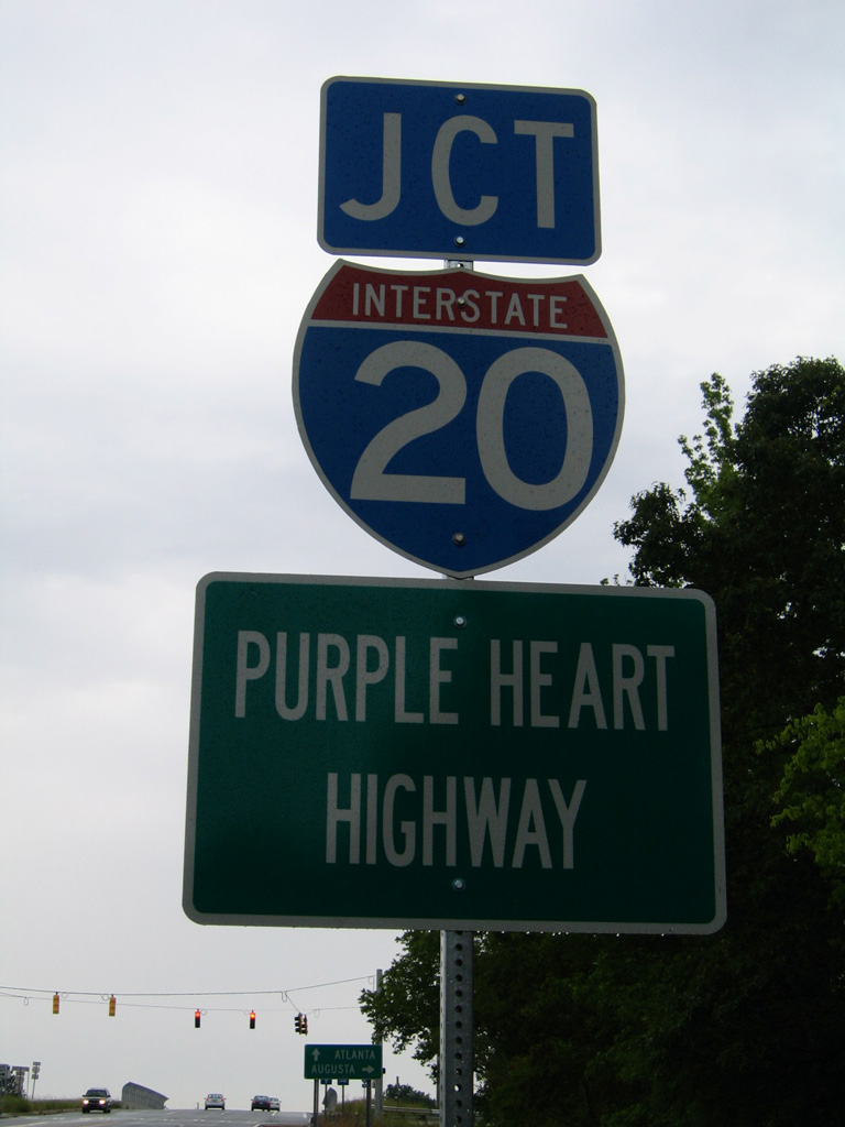 Neutered junction shield situated along Georgia 11 northbound at Interstate 20 Exit 98.