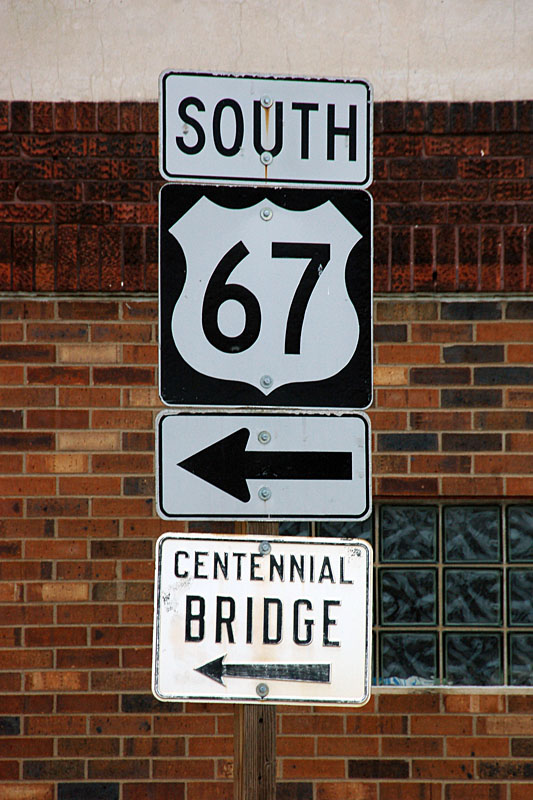 New shield and old trailblazer on the approach to the Centennial Bridge in Davenport.