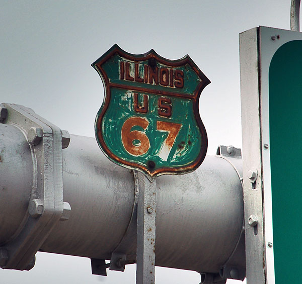 1940s highway marker still in service on the Centennial Bridge coming from Idaho. The bridge was renovated in 1996, and when old white guide signs were replaced with new green ones, the shield was repainted.