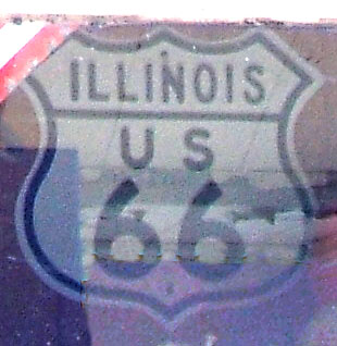 Replica of highway 66 marker. Illinois never used this style (embossed, round fonts).