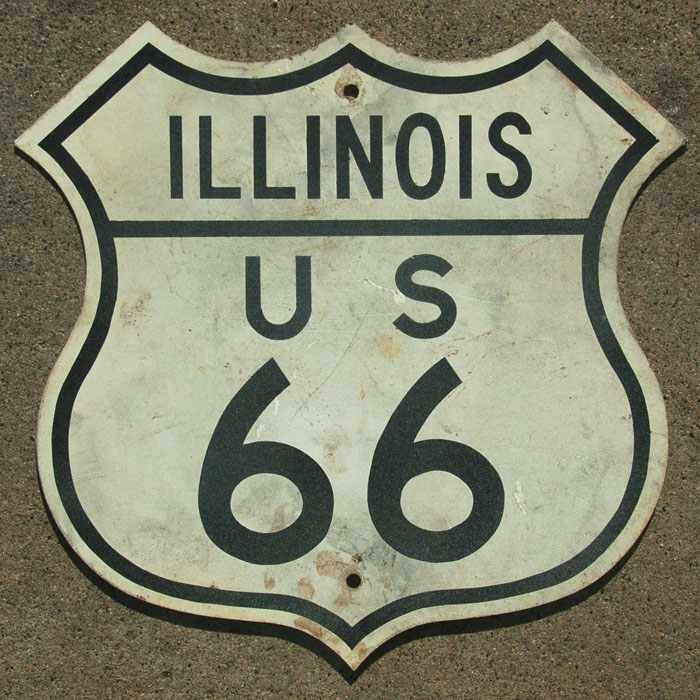 Genuine article.  Note reflective surface.  Illinois switched from steel to aluminum sometime between 1962 and 1967, and used the cutouts until 1970.
