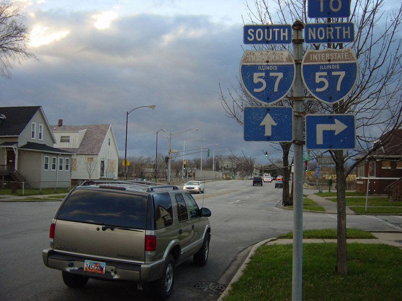 westbound W. 112th Place approaching Hamlet Avenue and Jct. I-57 in Chicago near Exit 354; these signs were revisited in September 2005 and are much worse for the wear.