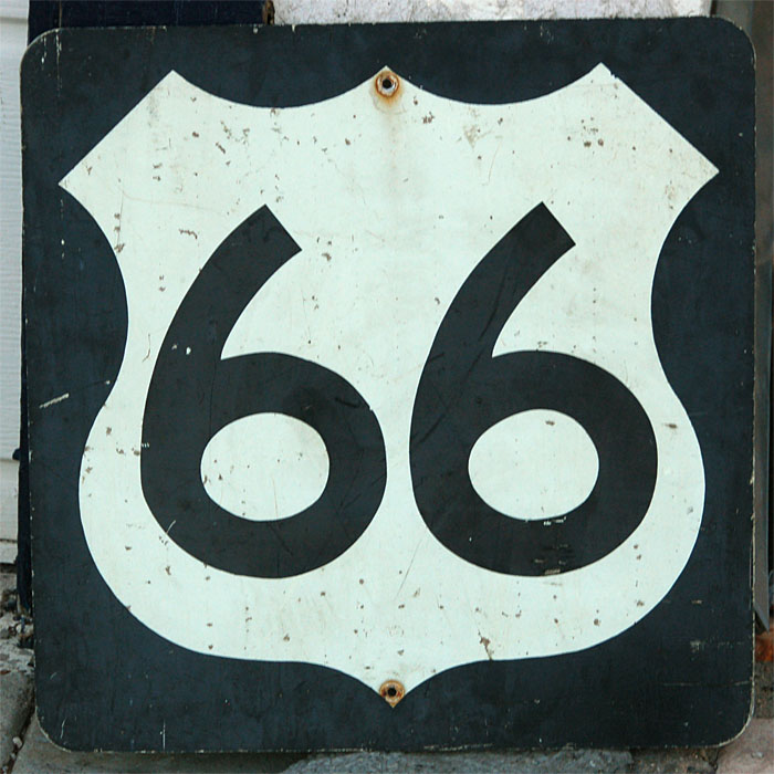 This sign dates to around 1968.  It is aluminum, with reflective sheeting, and has no number on the back, but does feature the Illinois Highway Department stamp.