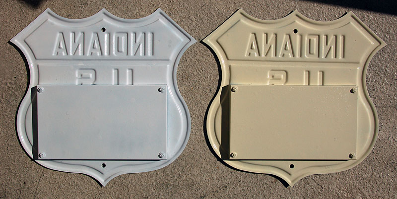 Replicas of 1930s highway markers.